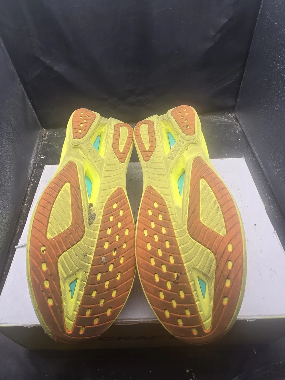 Hoka Kids White Sneakers with Black Swoosh and Orange Accents
